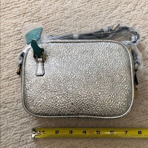 Silver Textured Crossbody Bag with Zipper Closure. Brand new